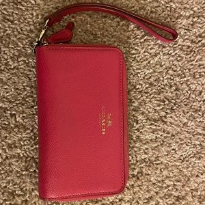 Bright pink Coach wallet